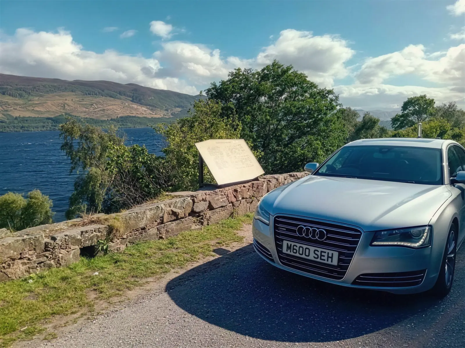 Audi A8 L at a Highland loch viewpoint